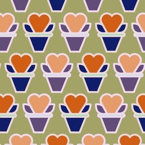 orange and purple heart plant design on green background