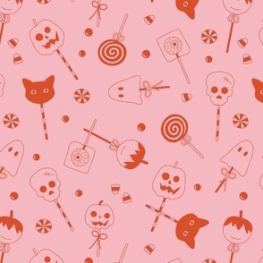 Halloween sweets and candy - ghosts cats zombies and pumpkins for fright night cutesy kawaii style lollipop orange on pink 