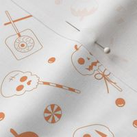 Halloween sweets and candy - ghosts cats zombies and pumpkins for fright night cutesy kawaii style lollipop orange on white 