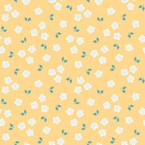 Scattered white flowers on caramel yellow