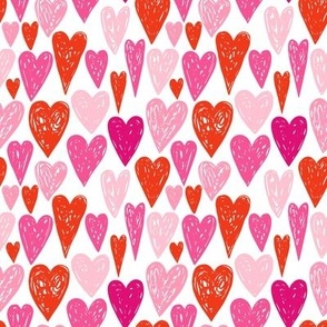 Doodle hand drawn hearts in pink and red colors for Valentine's day and love themed  designs
