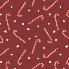 Christmas sugar canes and stars in red, cream, tan on maroon