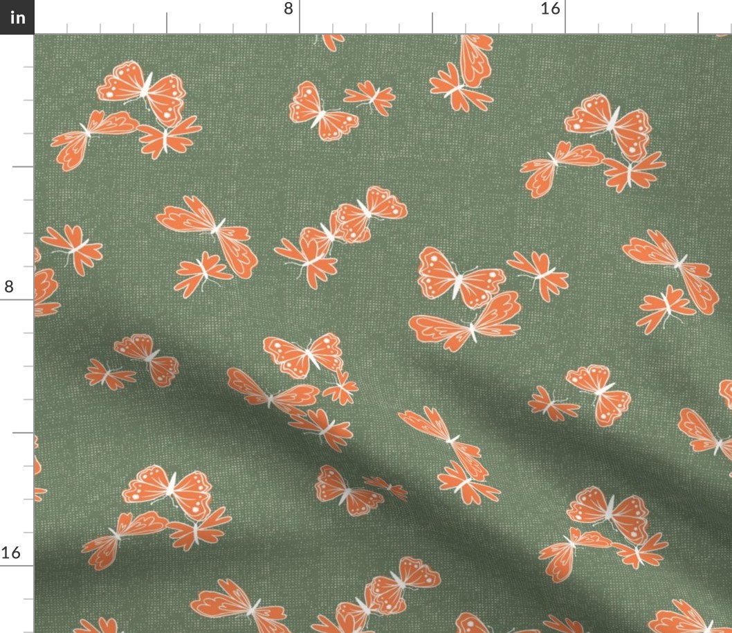 tangerine butterflies on forest green linen texture