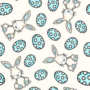 Medium Scale Spring Bunnies and Blue Easter Eggs on Antique White