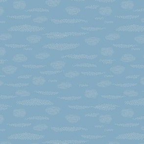 Winter blue clouds (fabric 6" - wallpaper 12" - wild horse collection) - A cloud inspired design in various blues on cream. Part of the wildhorses collection and is also available in green, pink and brown.