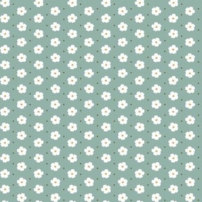 Little white flowers in teal