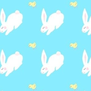 Bunnies and chicks on blue
