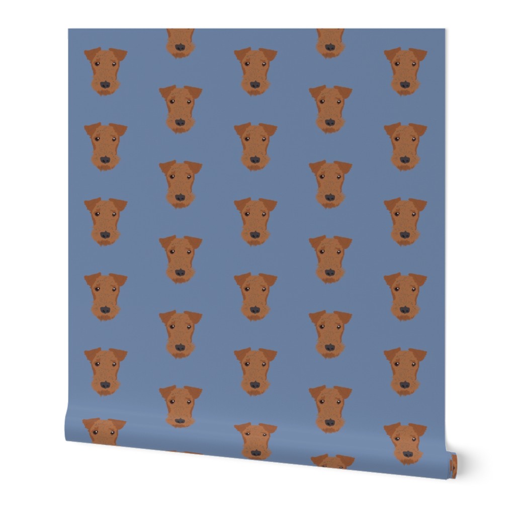 Airedale on Blue