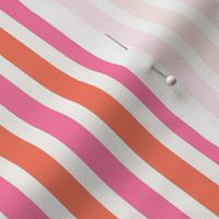 Candy stripe in hot pink and red orange on cream for wallpaper and home decor