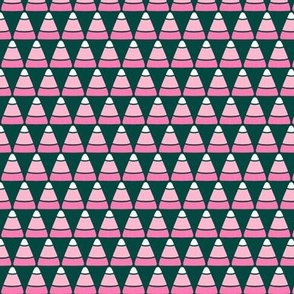Geometric candy corn pattern in pink and green. Part of the vintage style retro halloween collection.