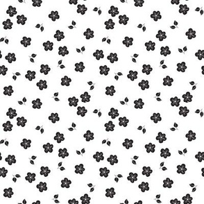 Scattered black flowers on white