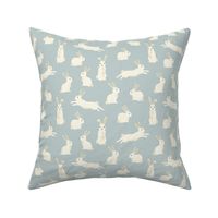 Cute Easter Bunny Rabbits on Light Blue
