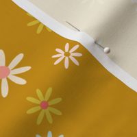 Multi-color spring daisies on yellow background 