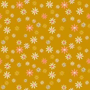 Multi-color spring daisies on yellow background 