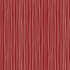Hand-drawn or painted white stripes on magenta red