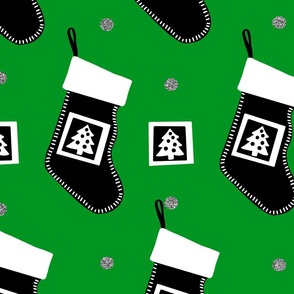 Black and White Christmas Stockings on Green 