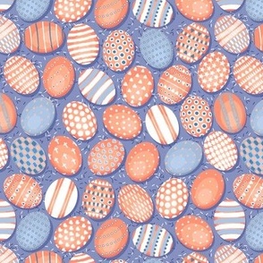 Small scale, Easter, Colorful eggs, Orange on a blue-lilac background 
