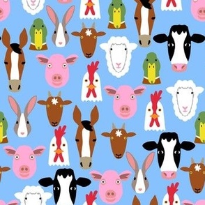 Farm animal heads on blue