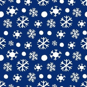 Seamless pattern of snowflakes on classic blue background