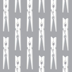 spring clothespin on grey