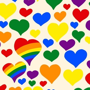 Tossed hearts with rainbow stripes on light yellow | medium