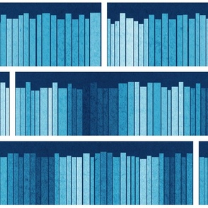 Normal scale // Rainbow books // monochromatic blue background white bookshelf