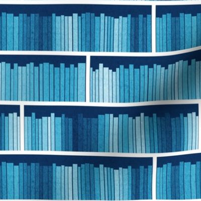 Small scale // Rainbow books // monochromatic blue background white bookshelf