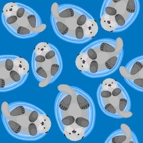 Cute sea otters  in ocean pattern