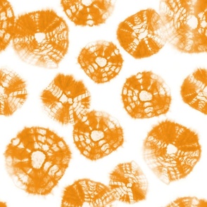 Shibori Kumo tie dye orange dots over white