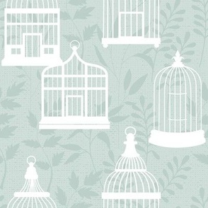 Birdcages in aqua with botanical leaves and texture