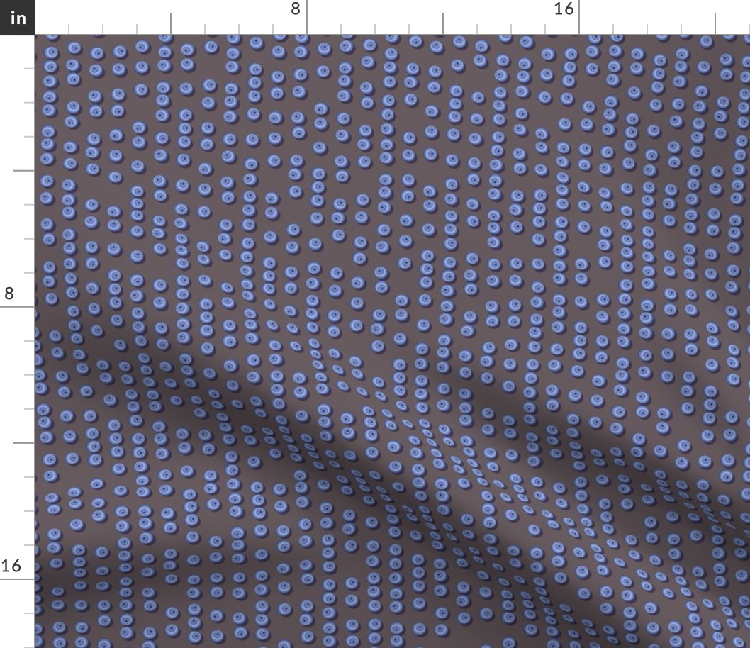 Blueberries arranged in stripes on a brown background