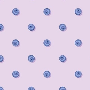 Blueberries in polka dot style on a light lilac background