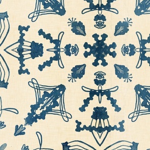 Large scale damask pattern in dark blue on a cream background with vintage linen texture