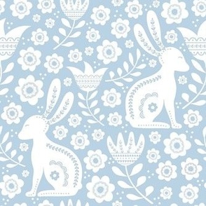 Medium Scale Folk Style Easter Bunnies on Soft Blue