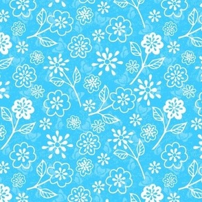 White Assorted Flowers on Light Bright Blue Butterflies