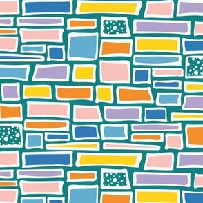  A Kaleidoscope of Bricks and Building Blocks on Blue Grass Green Colourful Masonry Wall
