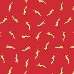 Pasta Campanelleon on a red background, small scale