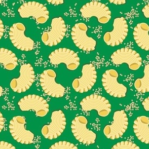 Pasta Creste di gallo and mustard seeds on a green background, Medium scale