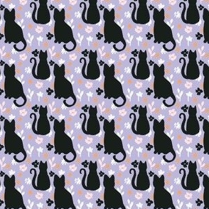 Small black cats and purple floral for pastel halloween. Cute fall for girls clothing and accessories