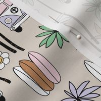 Surf boards and palm trees - camper van summer roadtrip adventures and smiley daisies nineties lilac green pink yellow palette