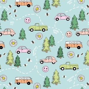 Summer road trip - forest road map adventure and vintage cars  daisy flowers and smileys green mint peach pink on blue