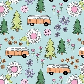 Summer road trip - hippie camper van smiley and flower power blossom cutesy summer design green orange pink on soft teal blue