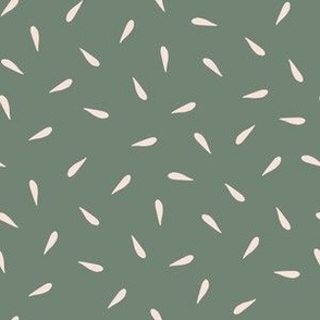 beige floral petals like polka dots on  artichoke green