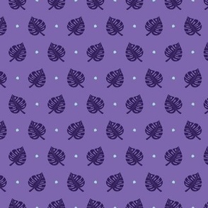 Small structured purple tropical monstera leaves on violet background 