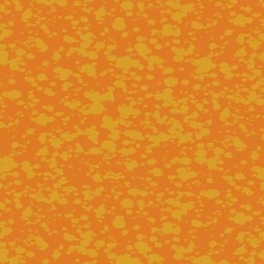 Two tone splatter texture in gold yellow and orange