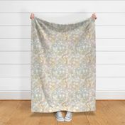 Small scale all over pattern of white daisies on blue and yellow marbled background with a vintage linen texture