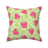 Tossed Spring Strawberries in Bright Pink and Green on Light Green - Large Scale