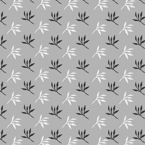 Gray color fabric with black and white leaves