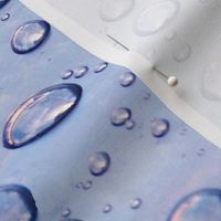 Raindrops on Blue Plastic