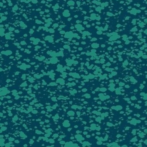 Two tone splatter texture in dark teal blue and emerald green